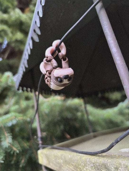 Mossy, the Dream-Hanging Sloth of Whispering Jungle